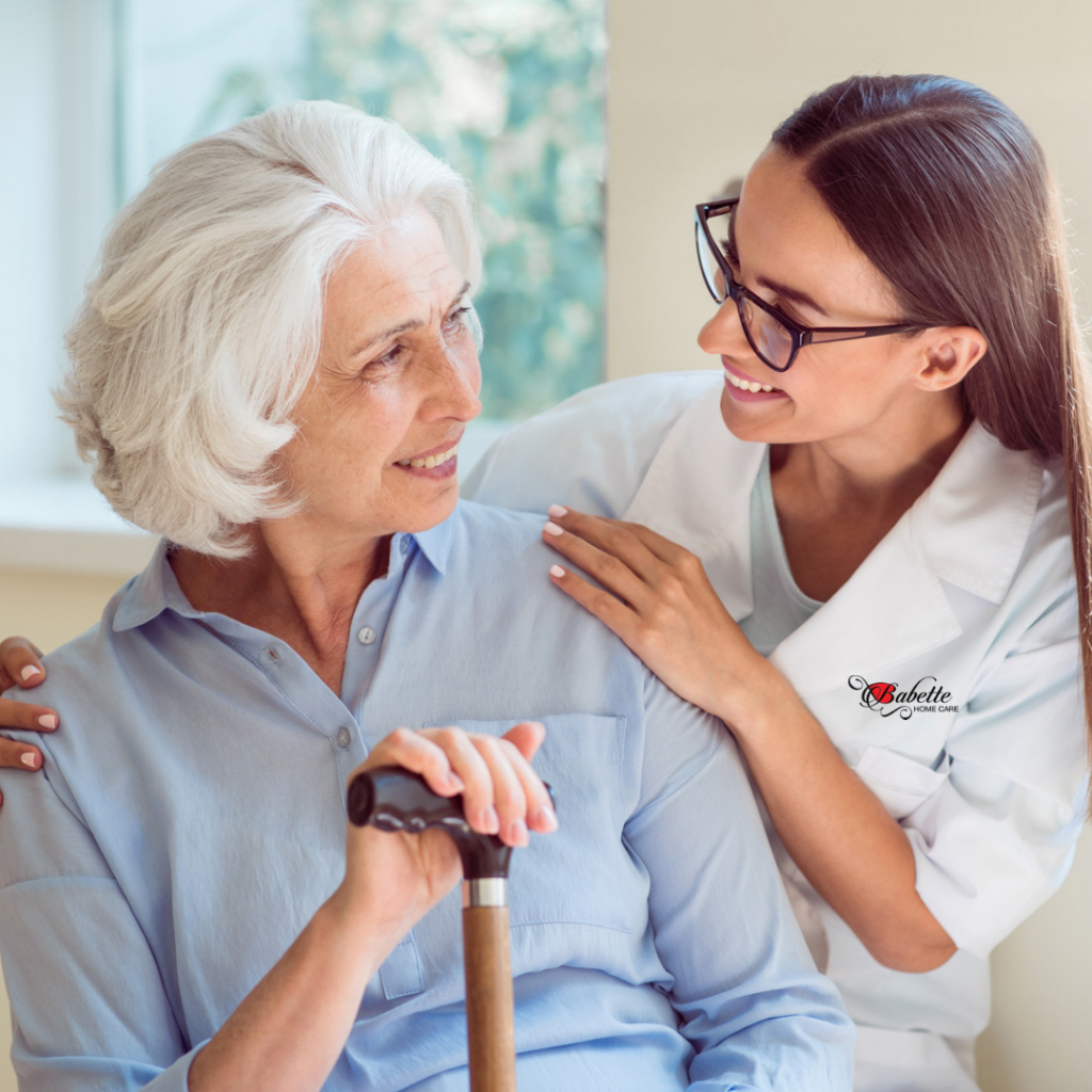 Caretaker smiling at woman